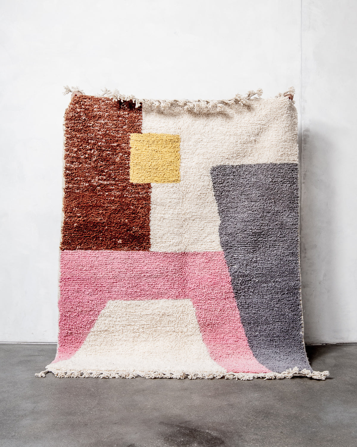 Modern, designer, handcrafted Berber rug from Morocco. Beniourain carpet with beautiful colours and patterns and fluffy wool texture.